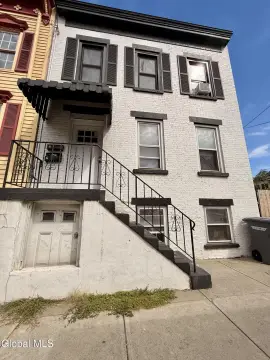 Brick Duplex with Renovated Unit