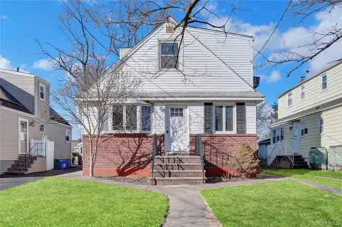 Expanded Cape-Style Home For Sale