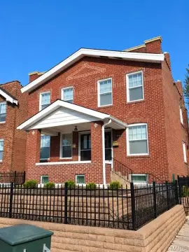 Two-Story Brick Duplex with Garage