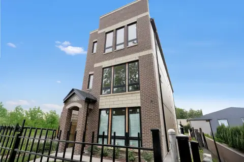 Three-Unit Masonry Triplex with Garage