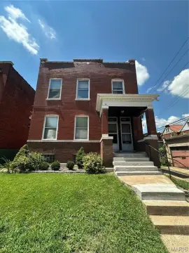 Brick Duplex with Rental Income