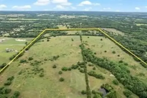 Rural Waterfront Acreage with Pond
