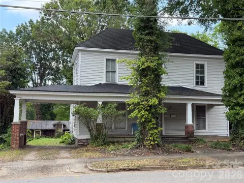 Three-Unit Triplex Residence