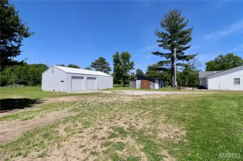 9.69 Acre Property with Outbuildings
