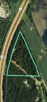 Wooded Highway Land