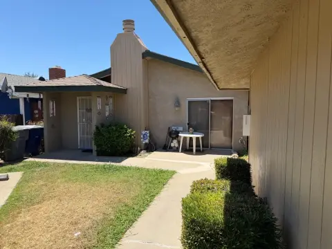 Pride-of-Ownership Triplex With Patios