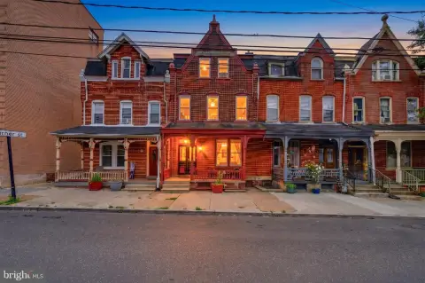 Brick Duplex with Garage and Carport