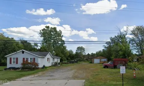 Commercial Land with Existing Building