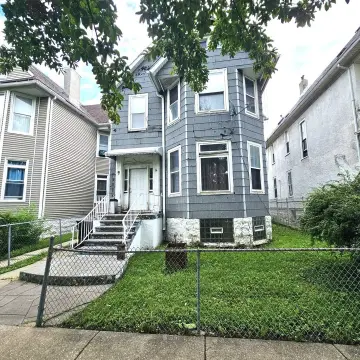 Two-Unit Frame Duplex with Yard