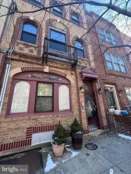 Fully Occupied Triplex with Roof Access