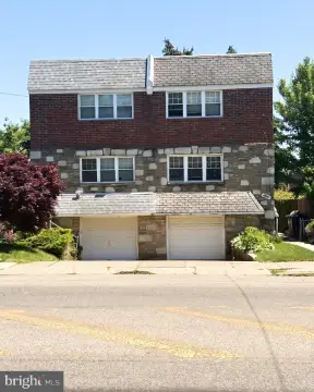 Brick Duplex with Two-Car Garage