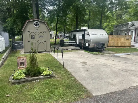 Waterfront RV Resort Lot with Camper