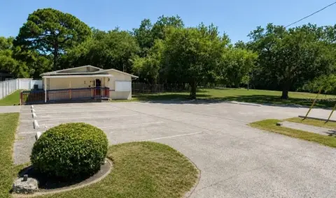 Corner Commercial Land With Improvements