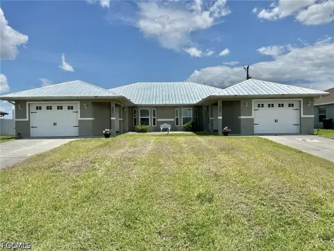 Well-Maintained Duplex with Southern Exposure