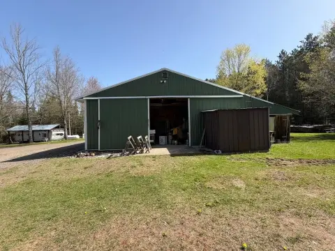 Northwoods Acreage with Garage & Trails
