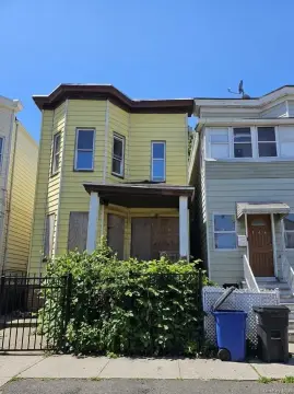 Fire-Damaged Two-Family Property