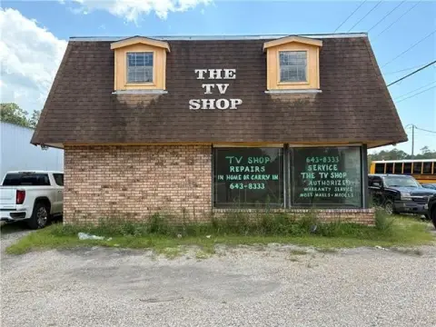 Commercial Land With Retail Building