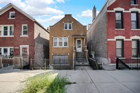 Brick Triplex with Coach House