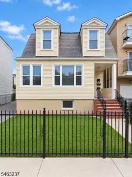 Duplex with Three-Car Garage