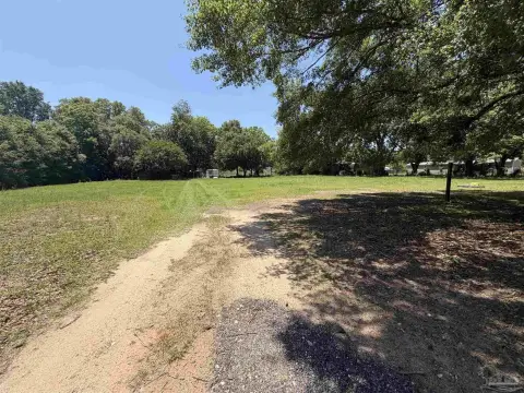 Fenced Agricultural Waterfront Parcel