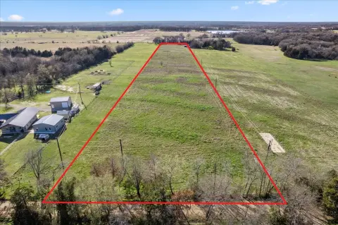 Fenced Acreage with Small Pond