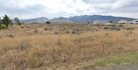 Spring Creek Land with Mountain Views