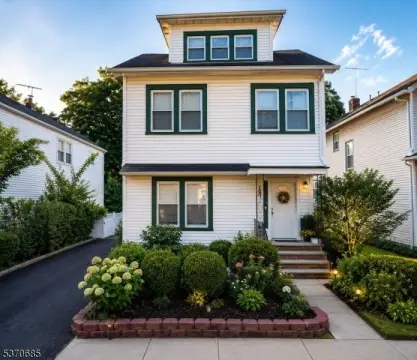 Renovation-Ready Duplex with Garage
