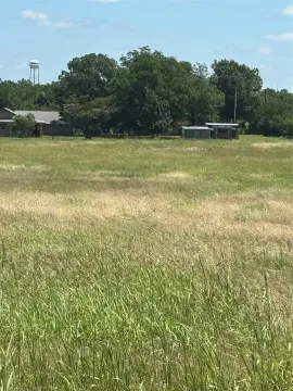 Acreage with Three-Side Paved Frontage