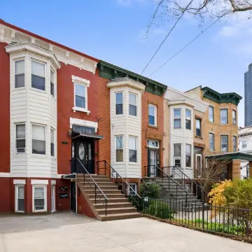 Two-Family Brick Rowhouse with Parking