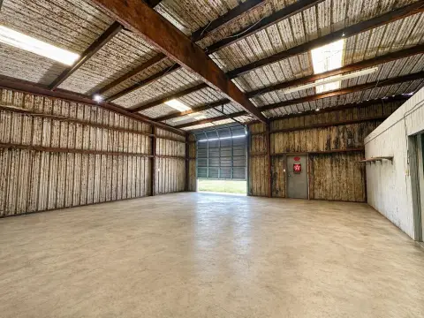 Metal Warehouse with Roll-Up Door