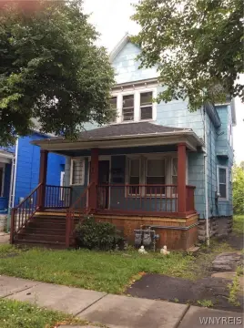 Vacant Duplex with Covered Porch