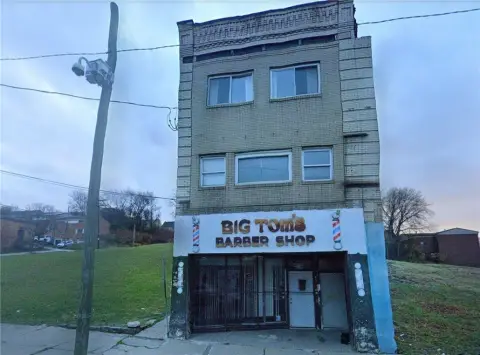 Mixed-Use Property with 4 Apartments