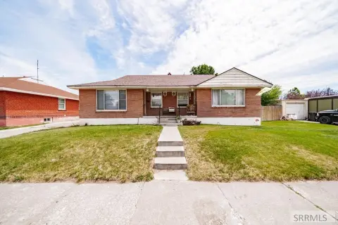 Duplex with Detached Single-Car Garages
