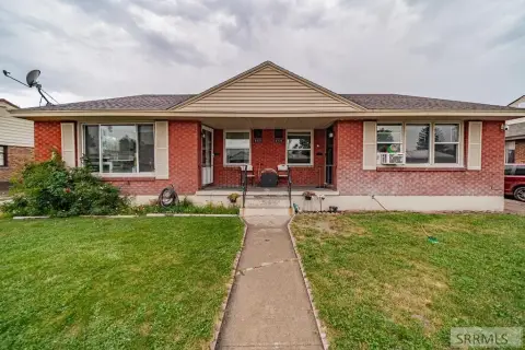 Duplex with Detached Single-Car Garages