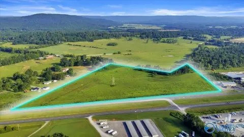 Fenced Agricultural Land with Highway Frontage
