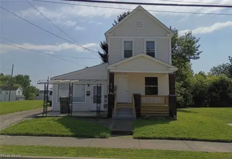 Updated Duplex With Three-Car Garage