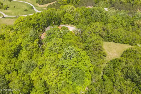 Wooded Waterfront Lot in Resort Community