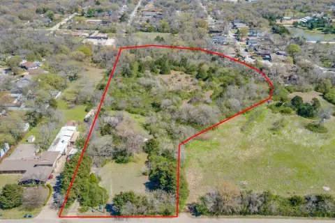 Improved Vacant Land with Creek Frontage