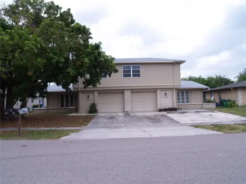 Updated Triplex with Garages
