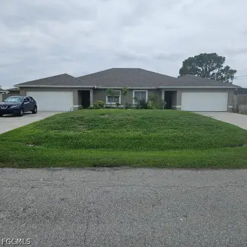 Duplex With Two-Car Garages