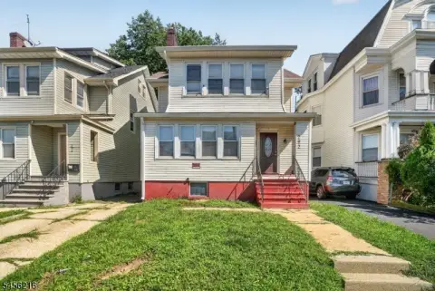 Two-Family Duplex Requiring Renovation