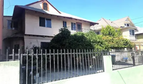 Two-Story Quadplex with Carport