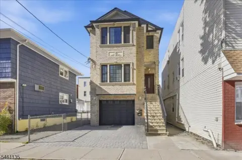 Three-Story Duplex with Fenced Yard