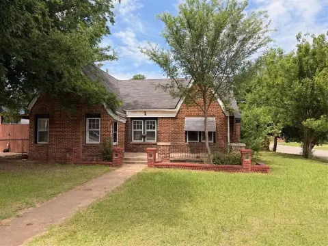 Brick-and-Frame Triplex