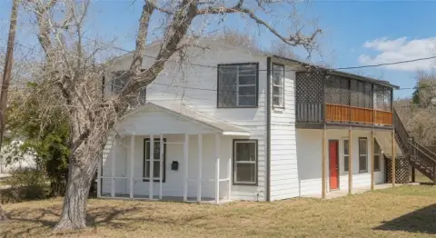 Triplex Property with Updated Apartment