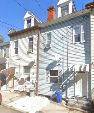 Occupied Two-Townhome Income Property