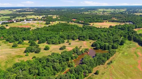 Wooded Agricultural Land with Pond