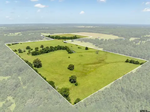 Fenced Agricultural Land with Pond