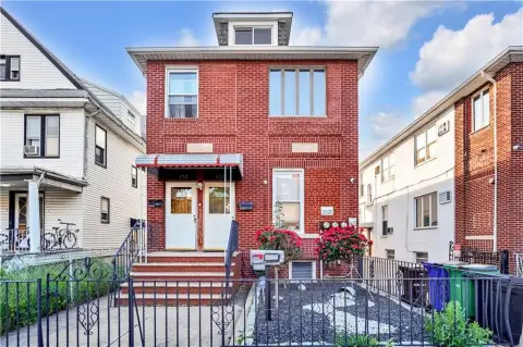 Detached Brick 3-Family Home