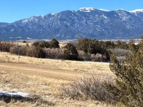 Land with Mountain and Plains Views